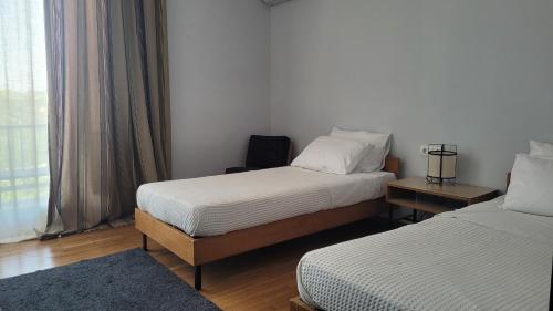 Cama o camas de una habitación en Theoxenia Hotel