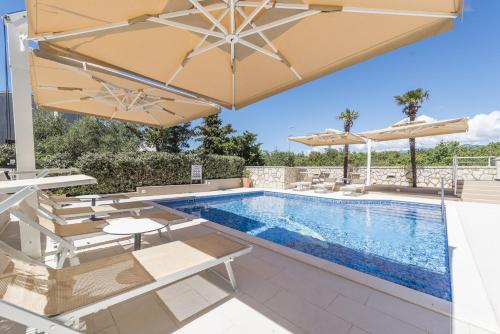 Family-friendly apartments with swimming pool Novalja, Pag - 14275