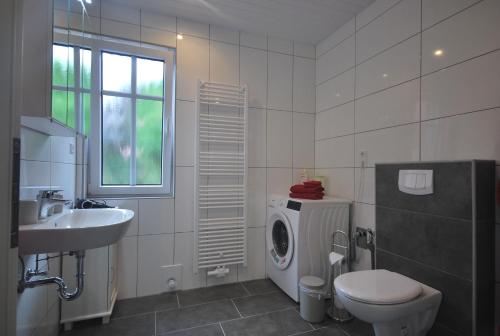 Koupelna v ubytování Ferienwohnung Up Hobarg 35523