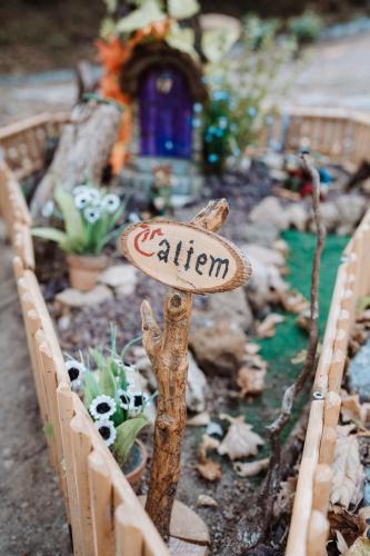 a miniature garden with a sign that says garden at Agriturismo le Fontane - Lago di Bolsena in Grotte di Castro