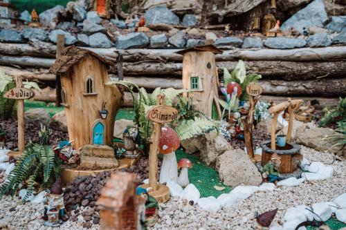 a model of a garden with a house and trees at Agriturismo le Fontane - Lago di Bolsena in Grotte di Castro