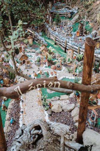 a model of a garden with a river and houses at Agriturismo le Fontane - Lago di Bolsena in Grotte di Castro