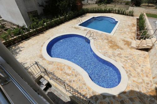 Bazén v ubytování Apartments Paradise nebo v jeho okolí
