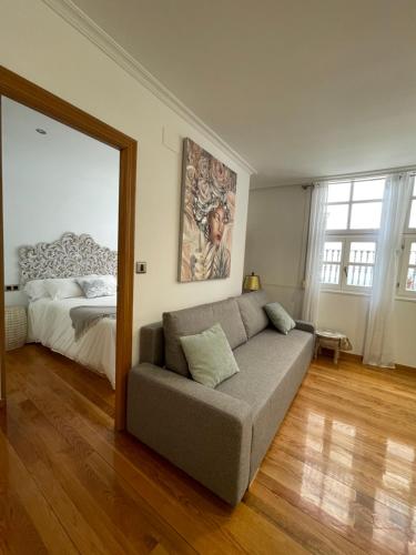 A bed or beds in a room at A Das Marias GALLERY