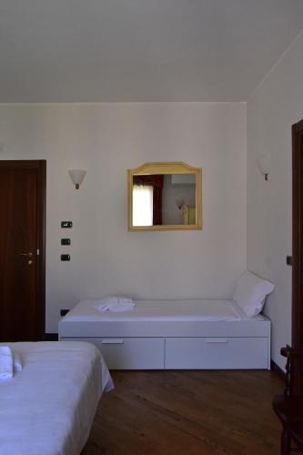 Postel nebo postele na pokoji v ubytování Hotel Pace