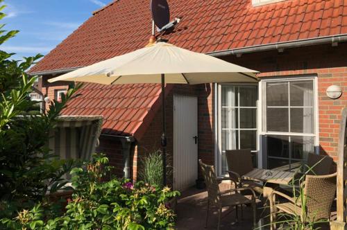 Fotografie z fotogalerie ubytování Ferienwohnung Lille Huus v destinaci Krummhörn