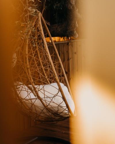 a net with two white bowls in a room at Zante Calinica Hotel in Tsilivi
