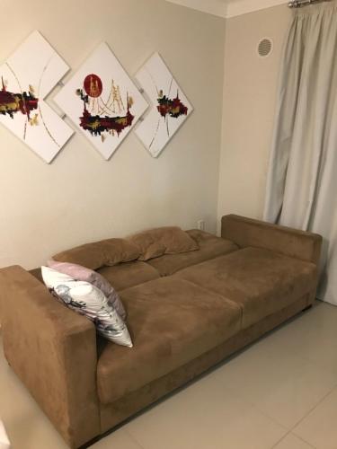 Khu vực ghế ngồi tại Resort e Spa Summer Beach Bombinhas apto 107