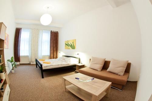 Postel nebo postele na pokoji v ubytování Apartmány - Penzion Smetanka
