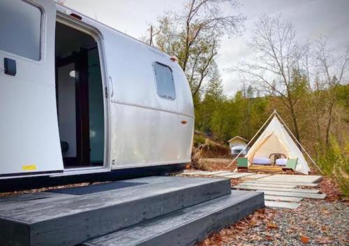 a white trailer sitting on top of some stairs at AutoCamp Cape Cod in Falmouth