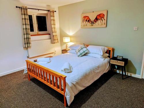 Postel nebo postele na pokoji v ubytování Country Lodge Retreat