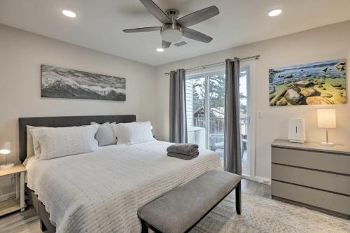 a bedroom with a bed and a ceiling fan at Epic Lake Tahoe Getaway Heavenly Daze Chalet in Stateline