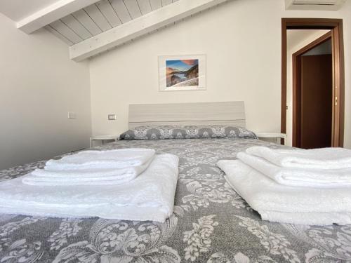 Postel nebo postele na pokoji v ubytování Casa Alda