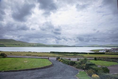 a view of a large lake on a cloudy day at Half Door House in Dingle
