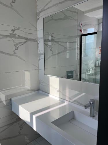 Koupelna v ubytování Kubi Hotel