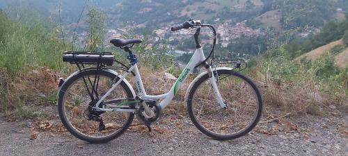 a bike parked on the side of a mountain at CASA LUDIZZO in Bovegno