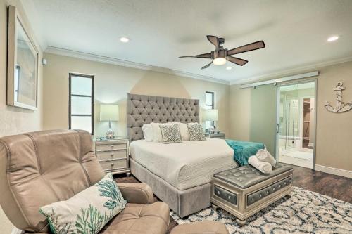 a bedroom with a bed and a ceiling fan at Luxe Cape Coral Escape with Pool 4 Mi to Beach in Cape Coral