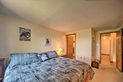 a bedroom with a large bed in a room at Mountain-View Campton Retreat about 3 Mi to Ski Slopes in Campton