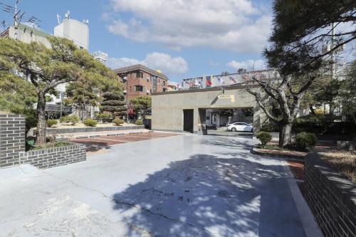 a parking lot in front of a building at Renaissance Hotel Pohang in Pohang