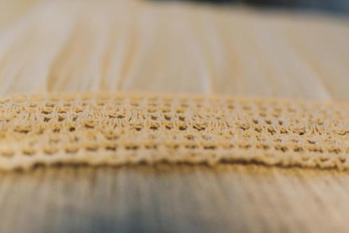 a close up of a mat on a table at LG Golden Suites in San Miguel de Tucumán