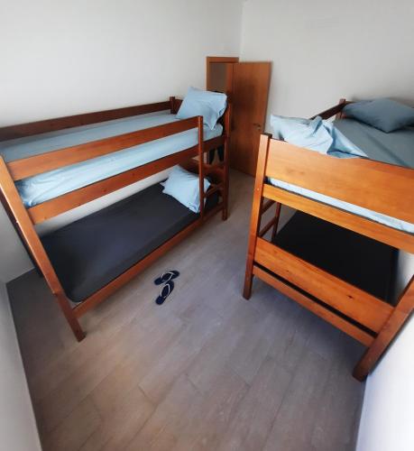 Katil atau katil-katil dalam bilik di Blue Sardine Hostel