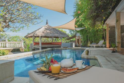 Πισίνα στο ή κοντά στο Villa Dinding Batu