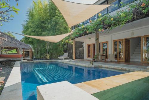Πισίνα στο ή κοντά στο Villa Dinding Batu