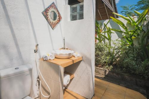Κήπος έξω από το Villa Dinding Batu