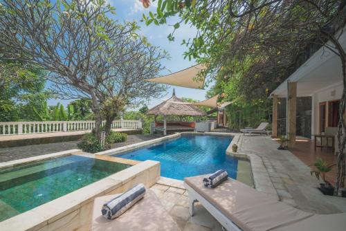 Πισίνα στο ή κοντά στο Villa Dinding Batu