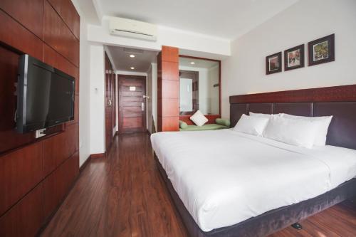 Cama o camas de una habitación en Hanoi E Central Luxury Hotel & Restaurant