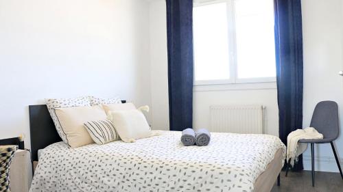 Letto o letti in una camera di Air'BABY - 1 à 6 PERSONNES - Colomiers Centre