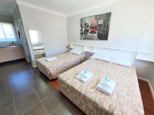 Postel nebo postele na pokoji v ubytování Maria Motel