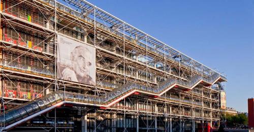 a large building being constructed with metal scaffolding at Chambres privées dans grand T4-Paris plein-centre in Paris