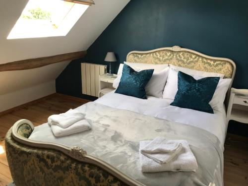 Кровать или кровати в номере La Grange Mignonne