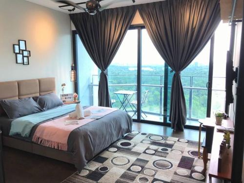a bedroom with a bed and a large window at Almas Forever Love 100mbps Netflix!! by STAY in Nusajaya