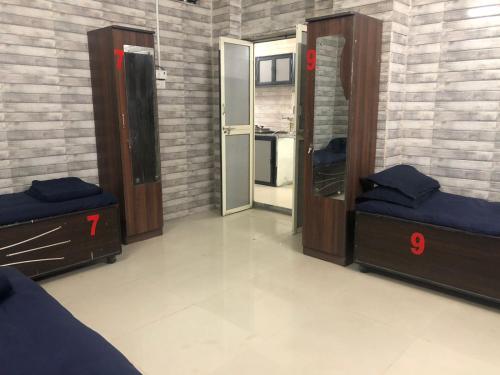 Postel nebo postele na pokoji v ubytování Charyana Backpackers