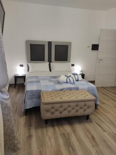 Postel nebo postele na pokoji v ubytování B&B Capovento Della Murgia