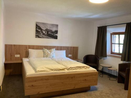 Postel nebo postele na pokoji v ubytování Brunnfeld Ferienwohnungen