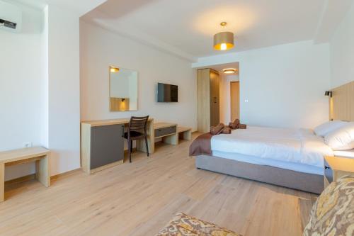 Cama o camas de una habitación en Lago Hotel