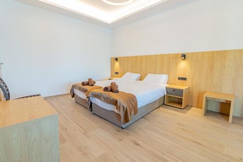 Cama o camas de una habitación en Lago Hotel