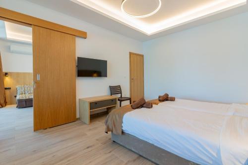 Cama o camas de una habitación en Lago Hotel
