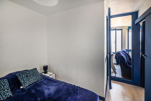 En eller flere senge i et værelse på Le front de mer