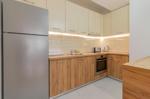 Кухня або міні-кухня у K&F Apartments