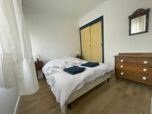 Кровать или кровати в номере Appartement avec vue sur mer