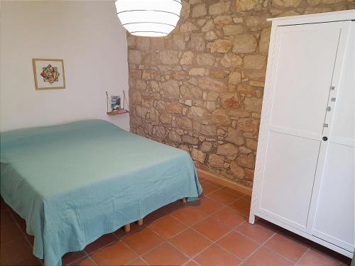 Postel nebo postele na pokoji v ubytování Sa Mannalissa casa vacanza