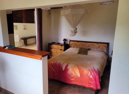 En eller flere senge i et værelse på Villa Dream