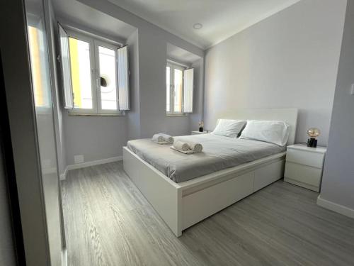Ένα ή περισσότερα κρεβάτια σε δωμάτιο στο CASA ALCOCHETANA