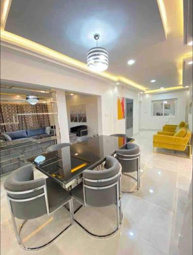 Posezení v ubytování Appartement Luxe idéalement situé à Dakar