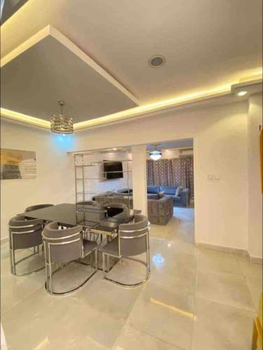 Posezení v ubytování Appartement Luxe idéalement situé à Dakar