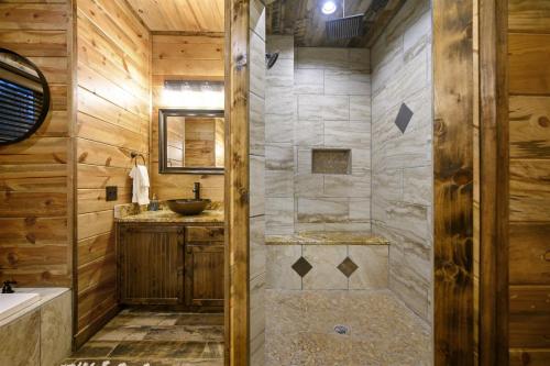 a bathroom with a shower and a sink at Misty Mountain in Stephens Gap